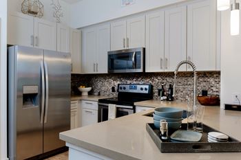 Gourmet chef kitchens with stainless steel appliances